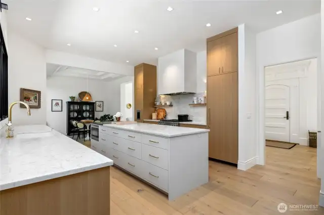 Another look at the amount of drawer storage and the seamless way the kitchen leads to the front of the home, perfect for entertaining!