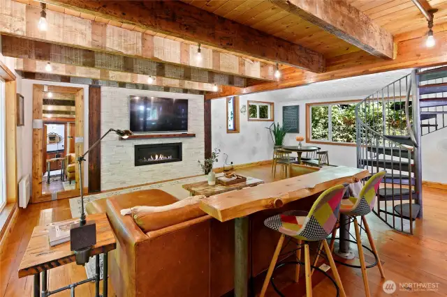 Wide plank pine floors look and wear beautifully! Homeowner added propane fireplace