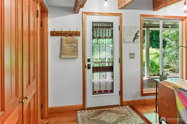 This beautiful stained glass door is just one of the many special touches in this home