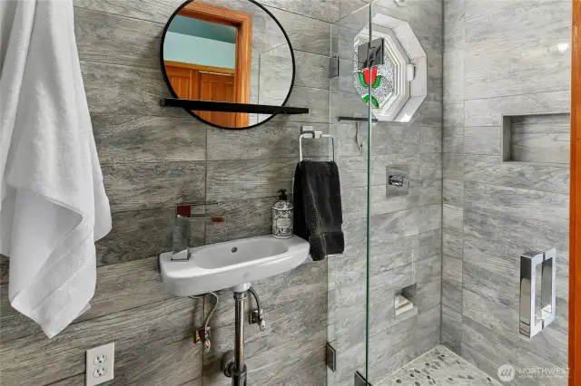Newly added stylish bath on second level.