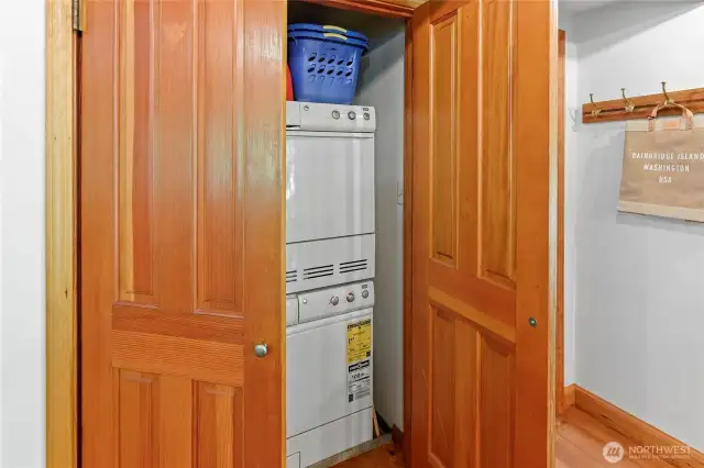 Main level laundry closet is next to bath