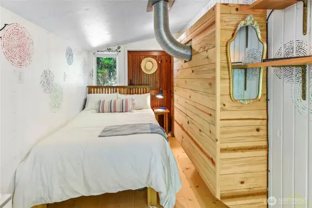 Informal room off porch - perfect for an office or guest sleeping space