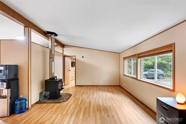 living room with wood burning fire place