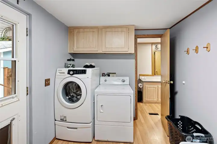 Laundry Room  w/ access to primary bathroom and backyard