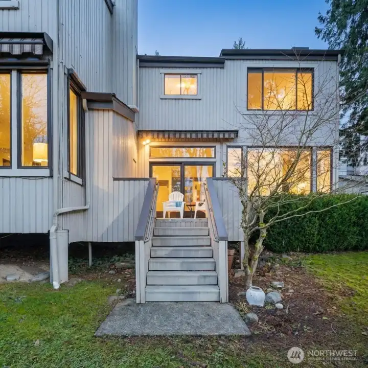Enjoy indoor/outdoor living from this light-filled townhome that looks out to Lake Washington.