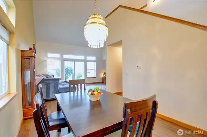 Dining area flows in between the kitchen and living area.