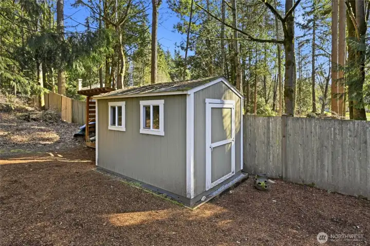 Shed at the back of the property for additional storage.