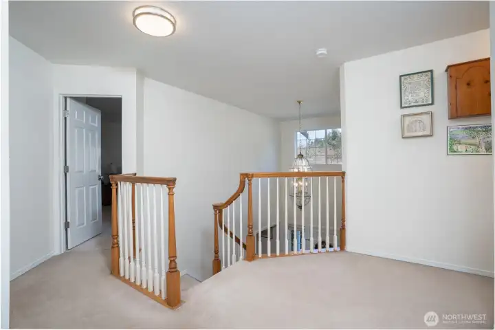 Upstairs offers bedrooms, additional living areas, and plenty of natural light for comfort and functionality.