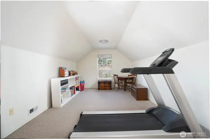 Spacious bonus room offers endless possibilities—perfect for a playroom, home office, media space, or hobby area.