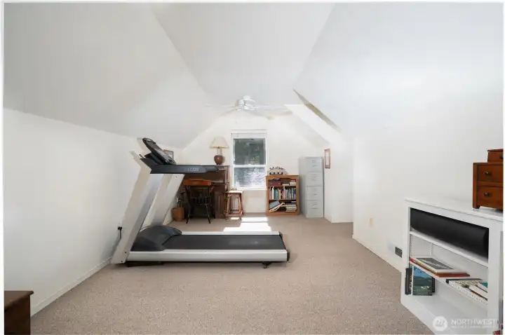 This large bonus room invites creativity and flexibility, ideal for whatever your family needs—game room, home gym, or extra living space.