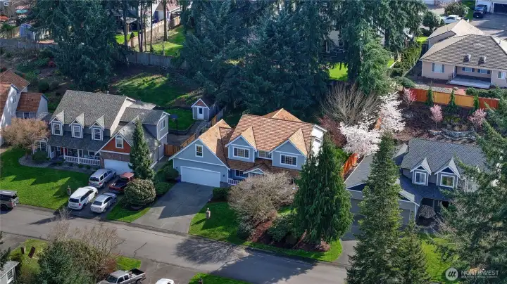 Gorgeous, well-maintained shake roof adds timeless charm and enhances the home’s curb appeal.