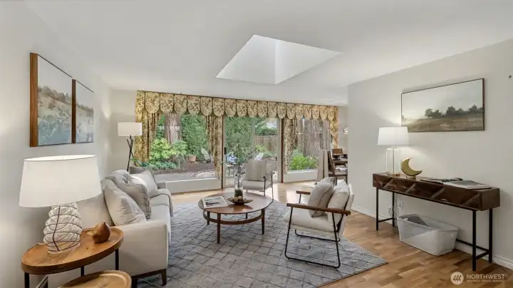 Skylight & large windows bring in   an abundance of natural light.