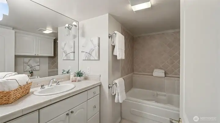 Unwind in the jetted soaking tub for a spa-like experience