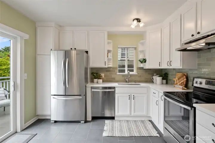 The large kitchen is both stylish and practical