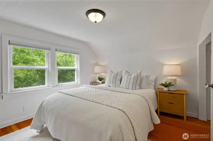 The upper-level lives like a private primary suite