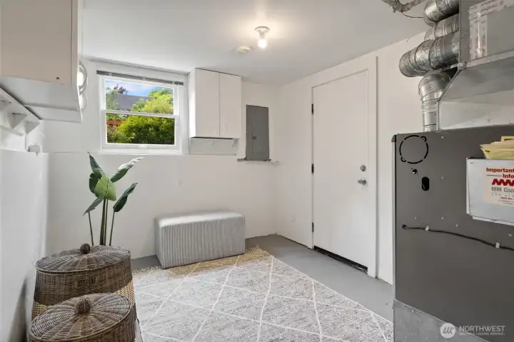 This space is perfect for a gear and mud room or a shop, and has convenient access to the attached garage