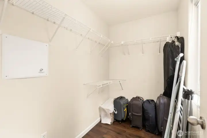 Walk-in closet for the master suite.