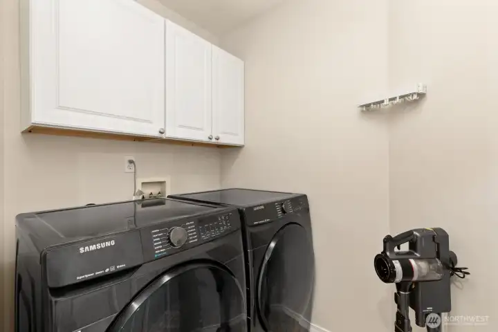 Laundry and utility room on upper floor.