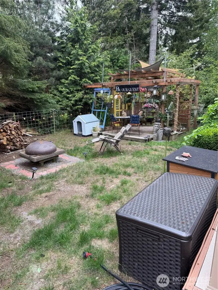 South side yard with fire pit and gazebo