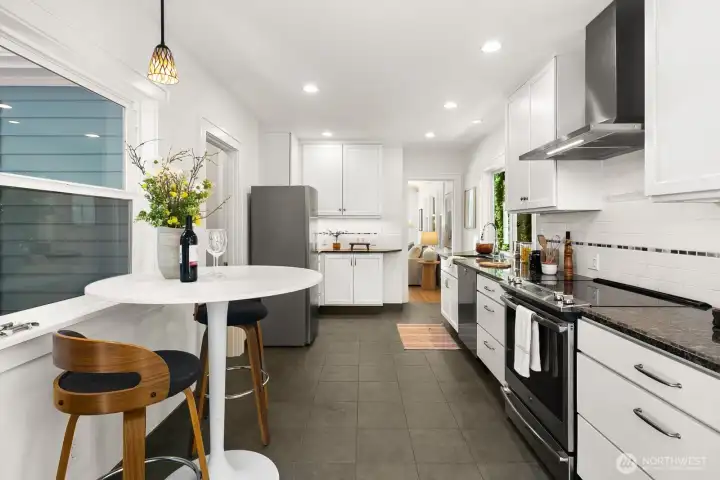 Remodeled kitchen opening to expansive back deck