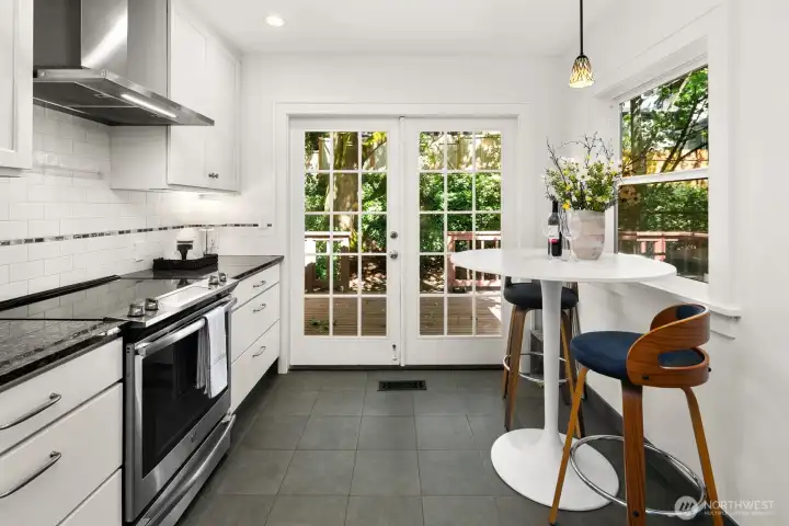 Remodeled kitchen opening to expansive back deck