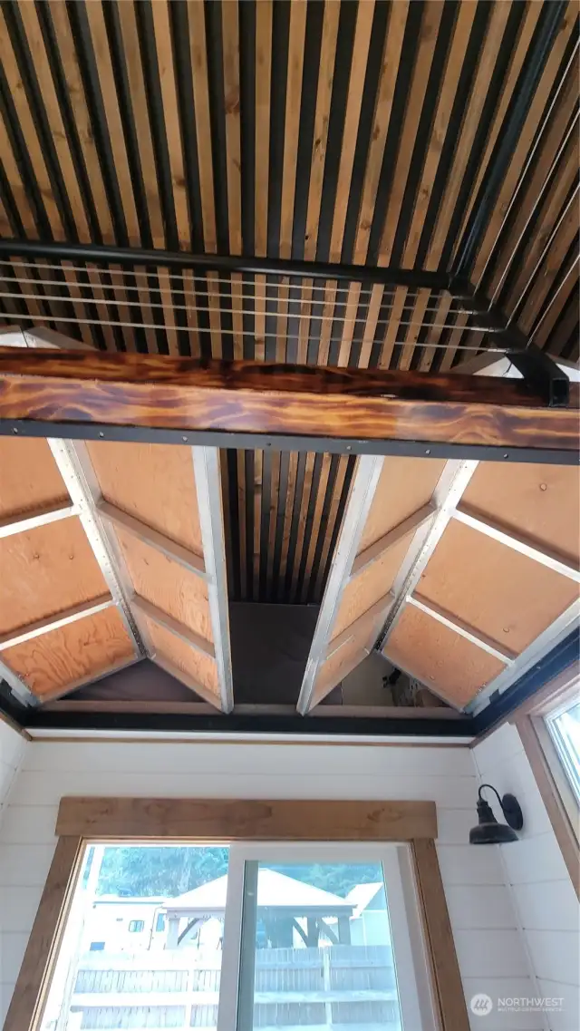 The floor of the second loft area cranks open to allow for a hammock.