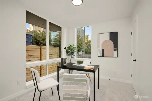 Flooded with natural light, this home office is perfect for staying productive. With peaceful views and a spacious layout, it's a work-from-home dream come true.