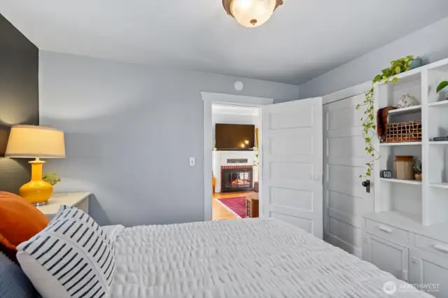 Cozy front bedroom is just off the living space.