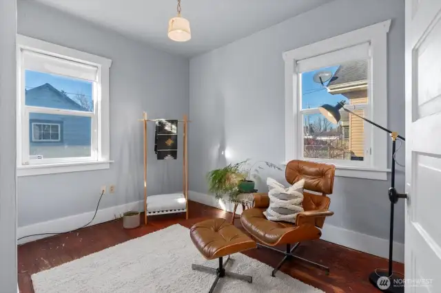 Back bedroom also features hardwood floors and nice views into the backyard.