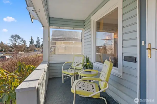 Lovely little "sit a spell" porch.