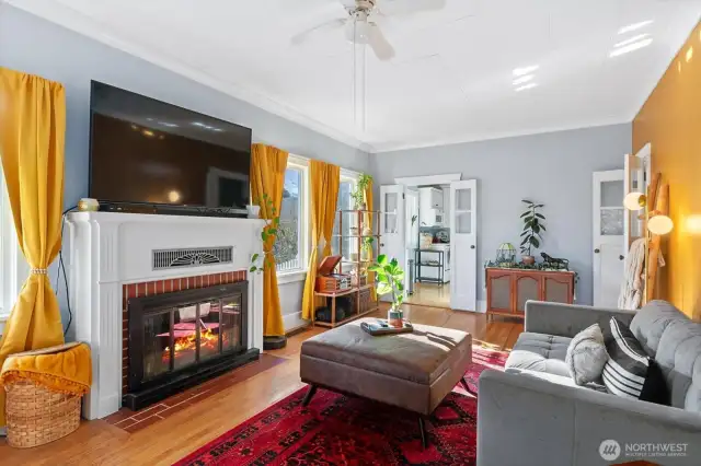 Unique to this home are the sweet French doors leading to the kitchen and also to the hallway.