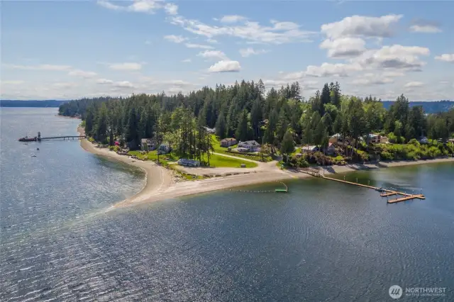 The north-east side of Herron Island showing ferry, community beach, boat launch and seasonal boat docks.