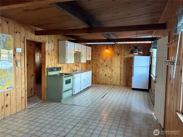 Open plan living/dining/kitchen.