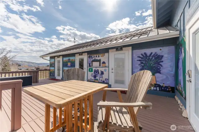Front porch area to studio apartment and two country store entrances.