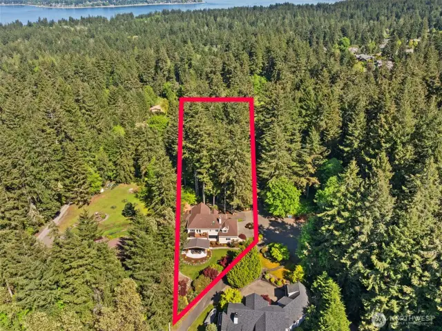 The lot is over 1.4 acres and goes all the way to the street