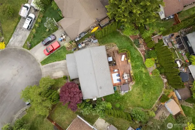 Aerial view of home in cul-de-sac.