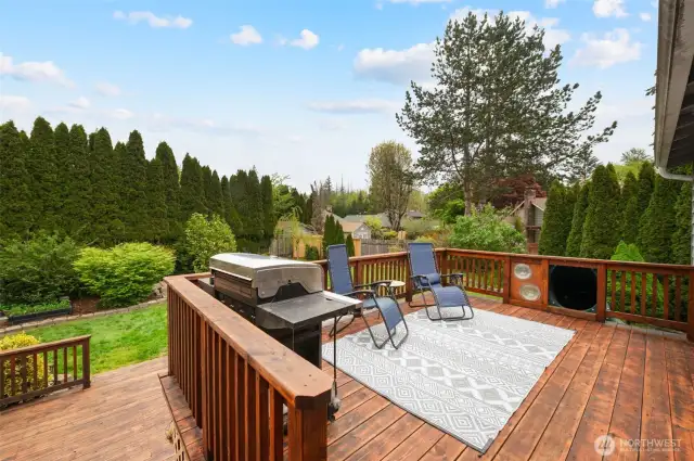 View of your beautiful new deck, with access to upper and lower level. Slide access on upper level of deck.