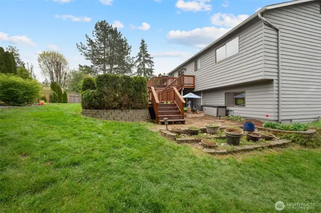 Side access to deck and extra room for planting.