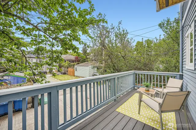 main deck right off of kitchen faces west and is large enough for an additional seating group - small fire pit perhaps?!
