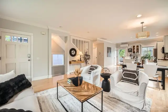Nice architectural elements like the open stairwell add to a sense of openness and connection to the upper floor