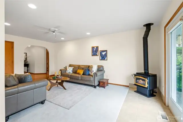 Family room has a free-flowing gas stove that works in power outages