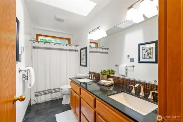 Full bathroom at the end of the hall.