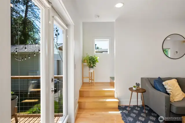 Enjoy filtered water views out the french doors off the living room.