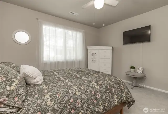 Another view of primary bedroom