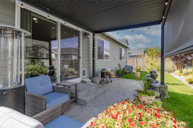 Fabulous outdoor space for entertaining or enjoying some private time at home. Pergola has retractable screen and louvers. Standing heater does not stay.