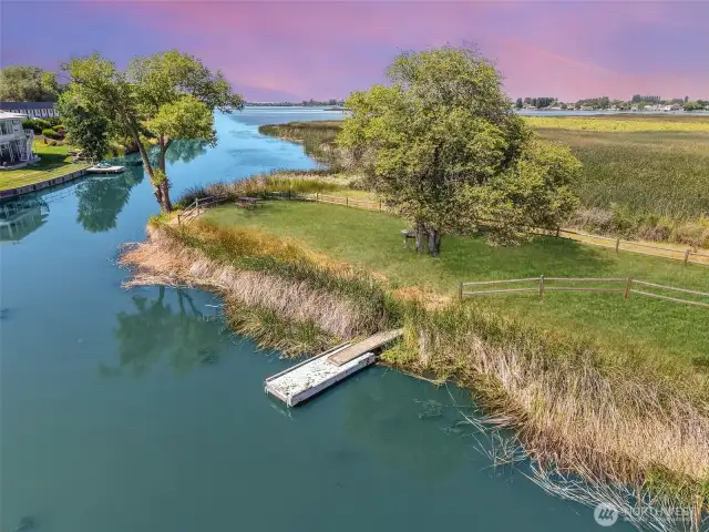 Located in a secure gated community, this stunning 3-bedroom, 2-bath residence offers comfort, privacy, and a community beach