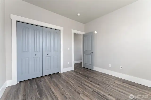 Inviting and refined, each bedroom boasts luxury vinyl plank flooring and carefully selected designer hues for a serene ambiance