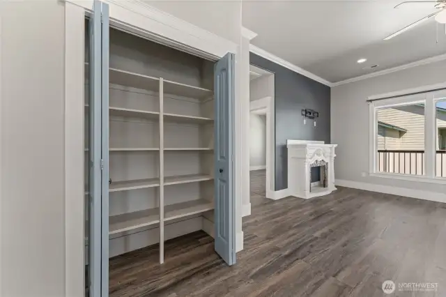 Ample storage solutions throughout the home, including a spacious pantry designed to keep your kitchen organized and clutter-free