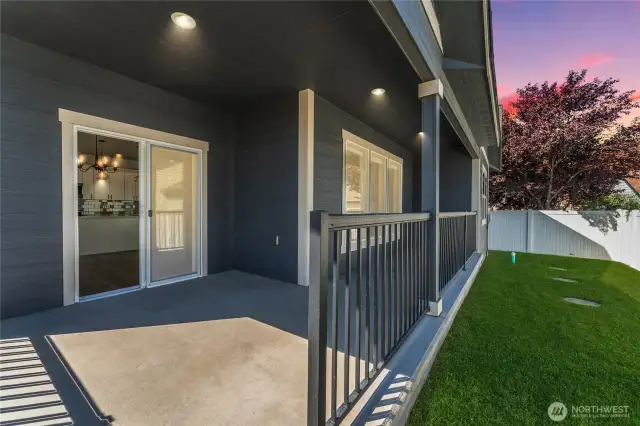 The lush, landscaped backyard is fully enclosed for privacy and peace of mind—ideal for gatherings or quiet moments