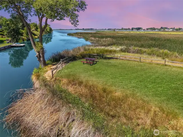A rare Amenity! Relax and unwind at the private community beach, offering serene waterfront views and direct lake access for residents